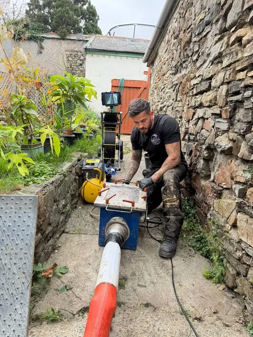 Devon Drainage Services engineer running a CCTV drain survey